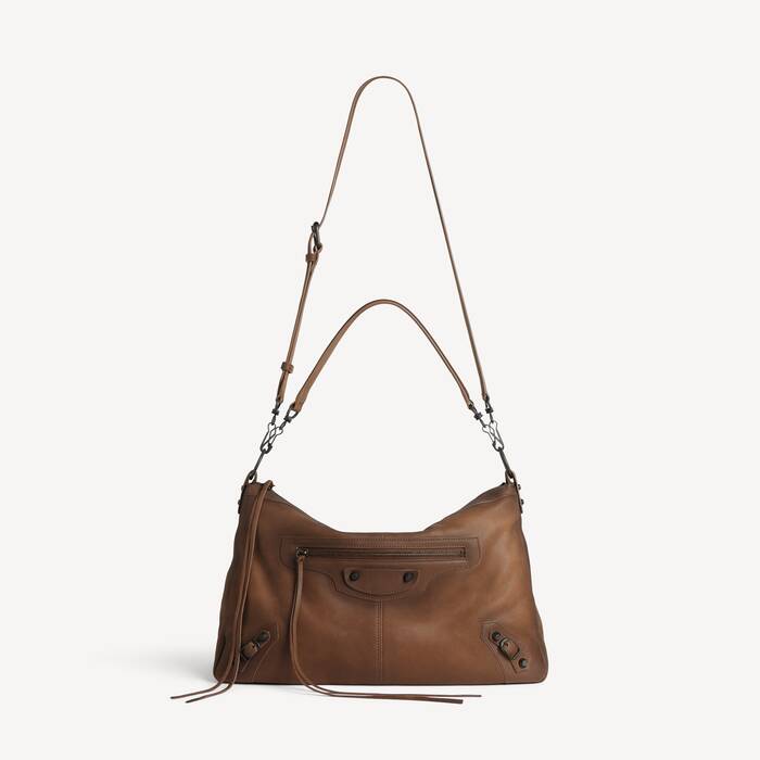 balenciaga grained leather sling backpack Calfskin Small Hourglass Shoulder Bag Black 1853240 FASHIONPHILE Backpacks Backpack realized in calf leather characterized by BB embossed logo on the entire surface and contrasting printed logo at the front Men's Bags | Balenciaga US