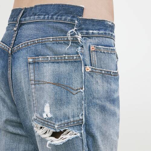 distressed patched jeans