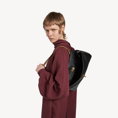 bolso con cadena rodeo east-west 