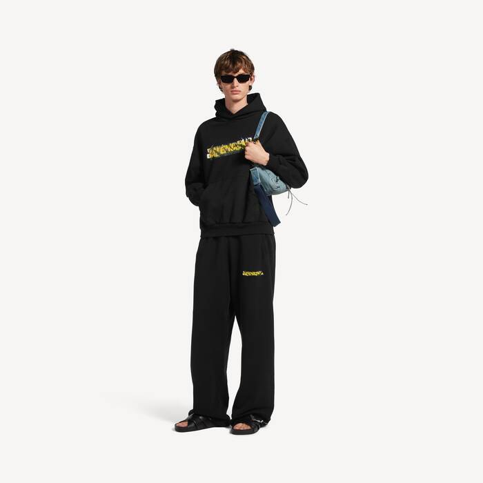 Men's Messy Spray Baggy Sweatpants in Black - Men | Balenciaga Australia EN - Image 1