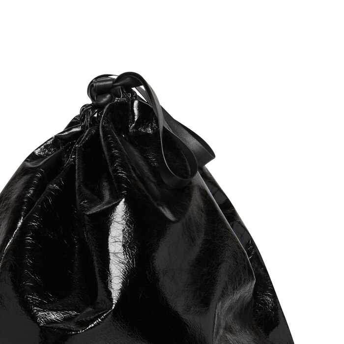 Balenciaga's $1.8k Winter 2022 Trash Bag Pouch Isn't Garbage