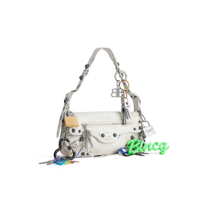 le cagole small sling bag used effect with charms 