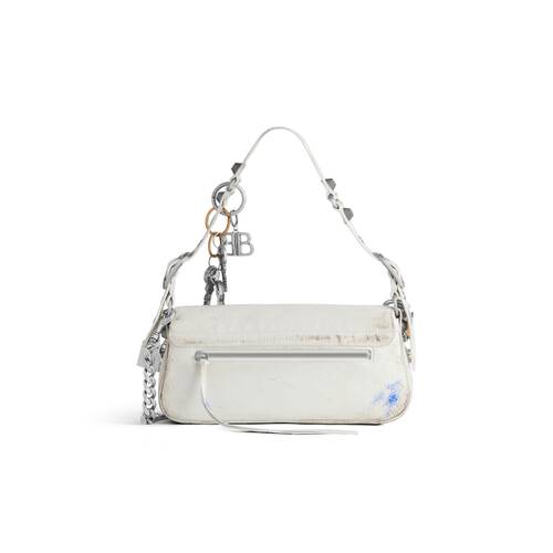 le cagole small sling bag used effect with charms 